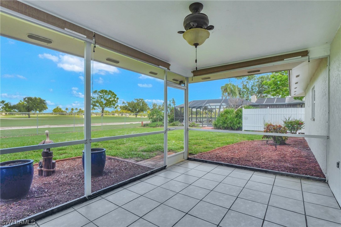 17508 Laurel Valley Road Fort Myers, FL 33967 - Photo 32 of 36 a view of a porch with furniture and yard