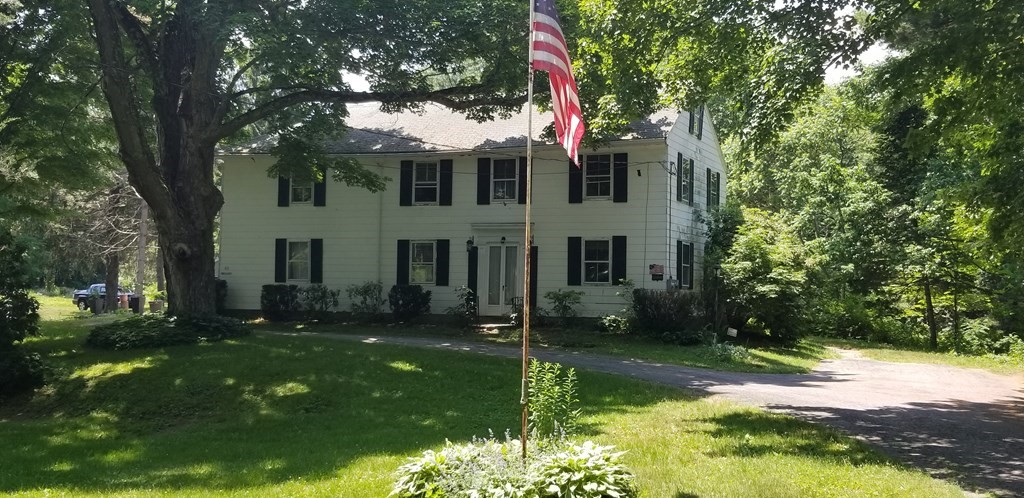 60 Bemis Road Warren, MA 01083 - Photo 8 of 15 a view of a white house with a yard