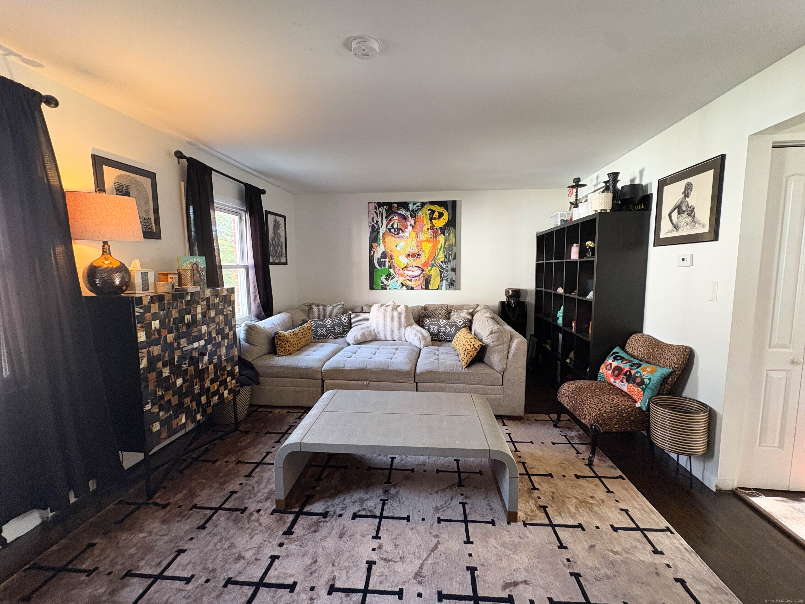 32 Karen Court, Unit B Bridgeport, CT 06606 - Photo 10 of 20 a living room with furniture rug and window