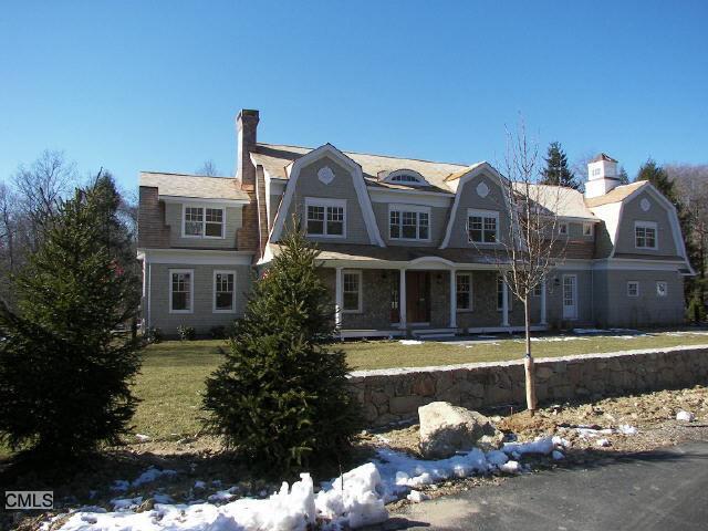 114 Vista Road Wilton, CT 06897 - Photo 1 of 1 a front view of a house with a yard