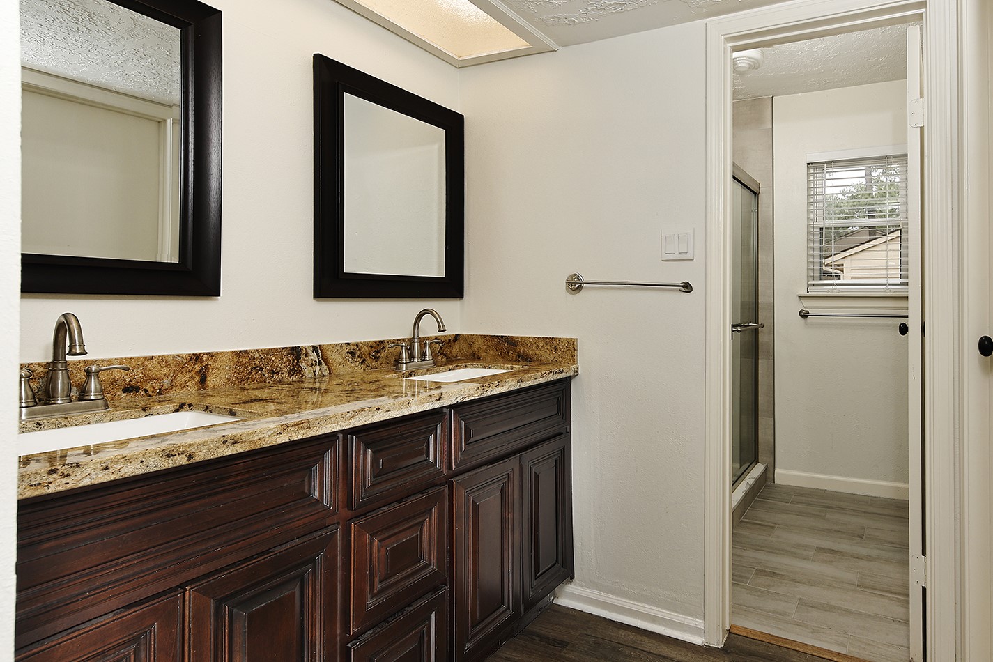 30 Berryfrost Lane Spring, TX 77380 - Photo 13 of 23 a bathroom with a granite countertop double vanity sink and mirror