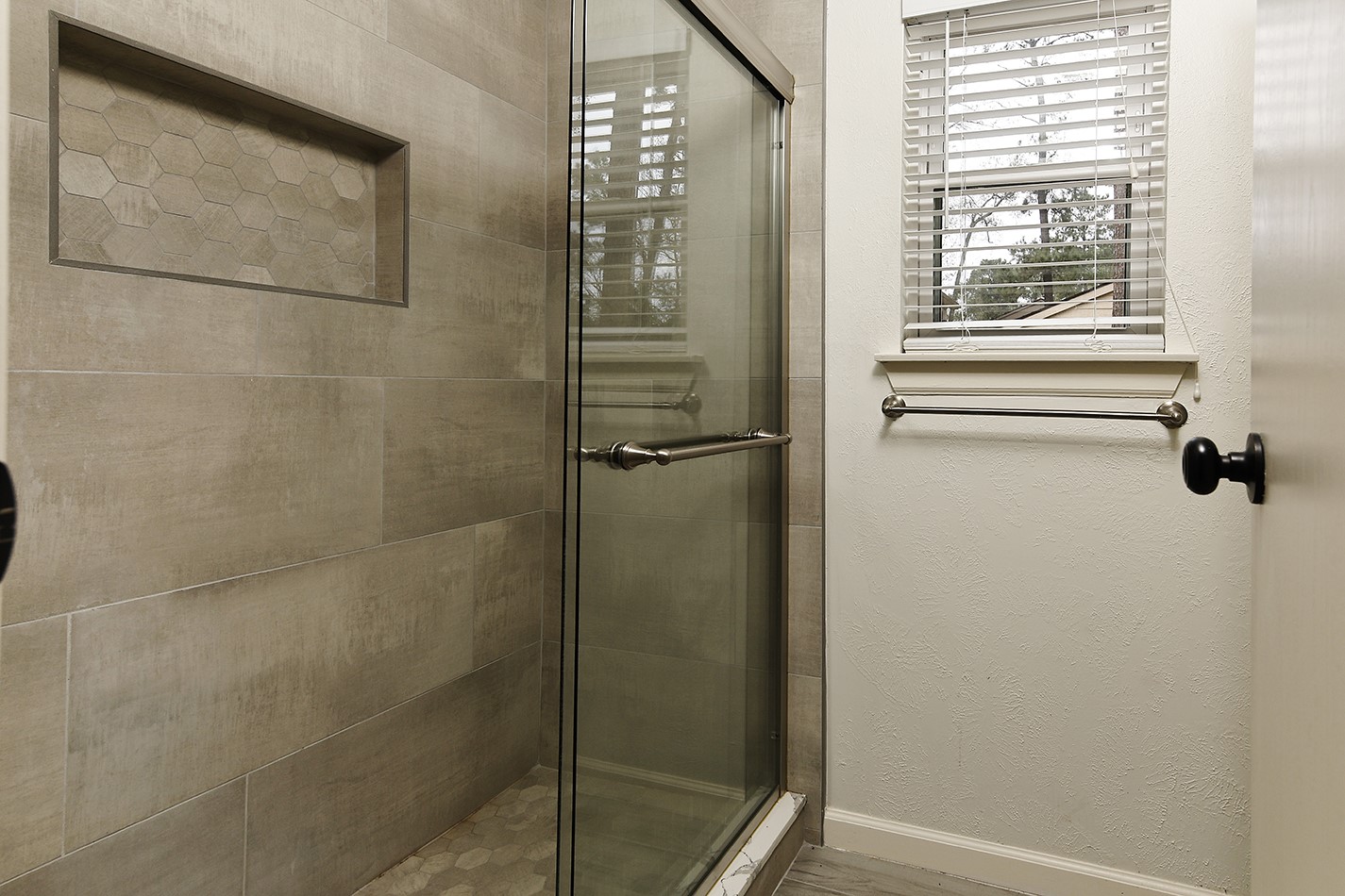 30 Berryfrost Lane Spring, TX 77380 - Photo 14 of 23 a bathroom with a glass shower door