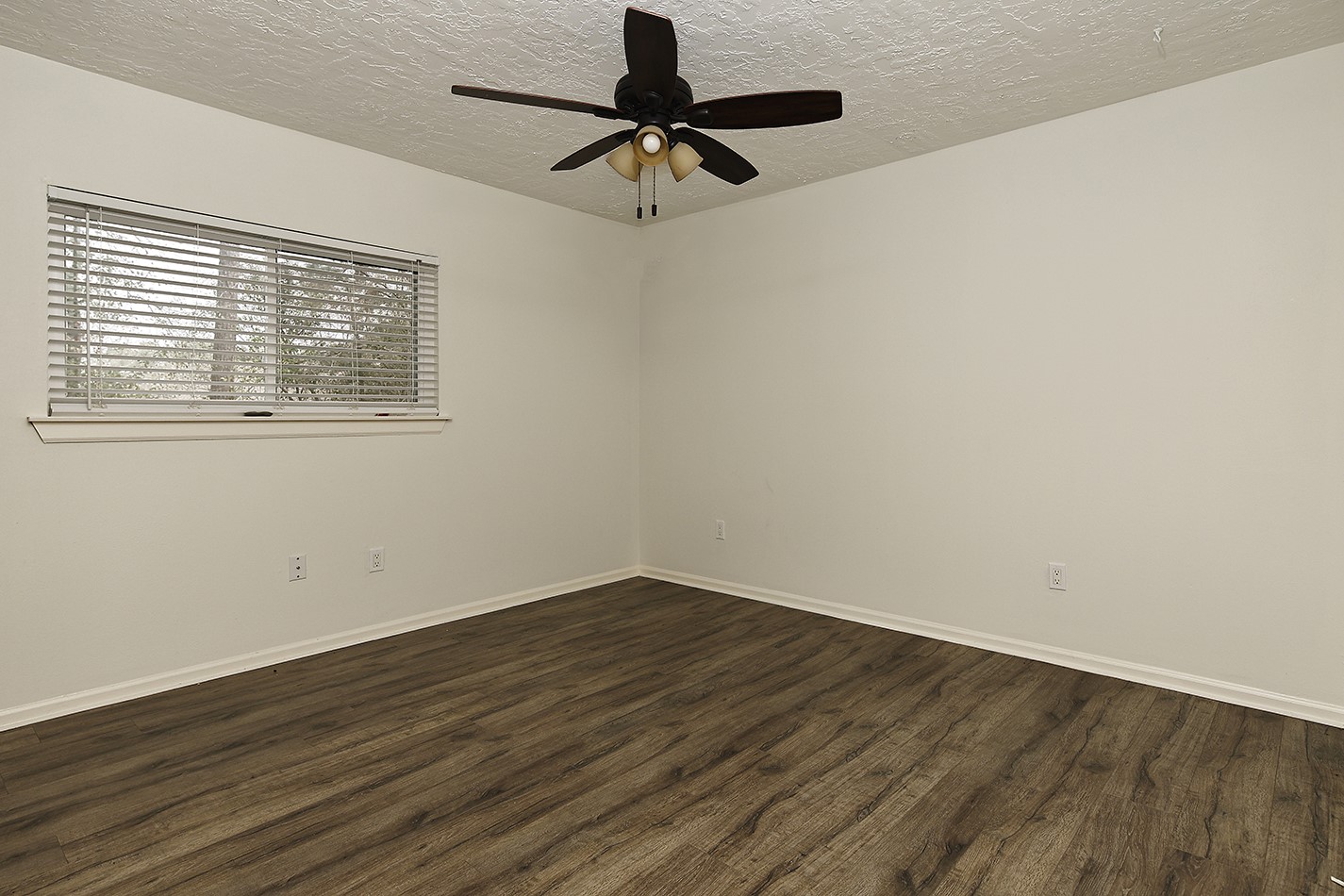 30 Berryfrost Lane Spring, TX 77380 - Photo 20 of 23 wooden floor in an empty room with a window