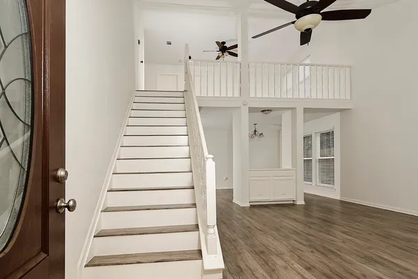 a view of a entryway with wooden floor