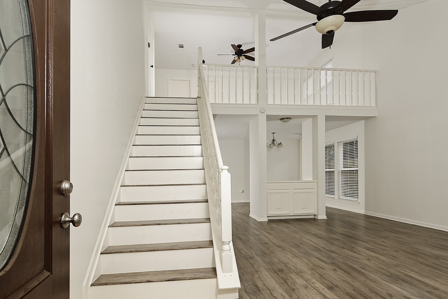 30 Berryfrost Lane Spring, TX 77380 - Photo 2 of 23 a view of a entryway with wooden floor