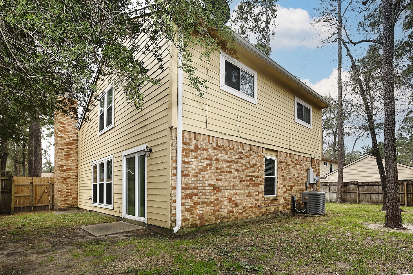 30 Berryfrost Lane Spring, TX 77380 - Photo 21 of 23 a view of a house with a yard