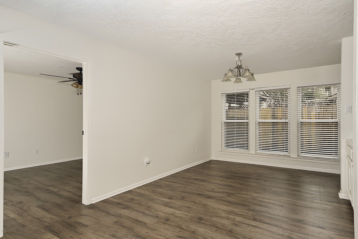 30 Berryfrost Lane Spring, TX 77380 - Photo 5 of 23 a view of an empty room with wooden floor and a window