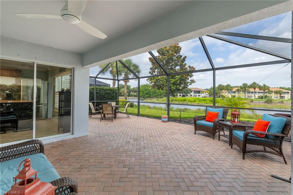5801 Declaration Court Ave Maria, FL 34142 - Photo 24 of 38 a view of a patio with a table and chairs