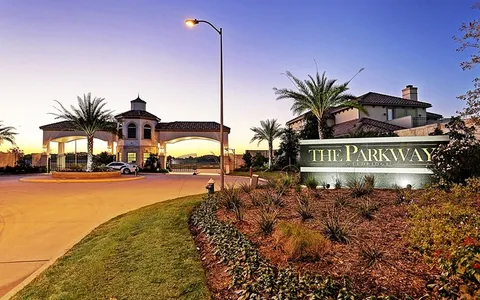 a sign board with parking space