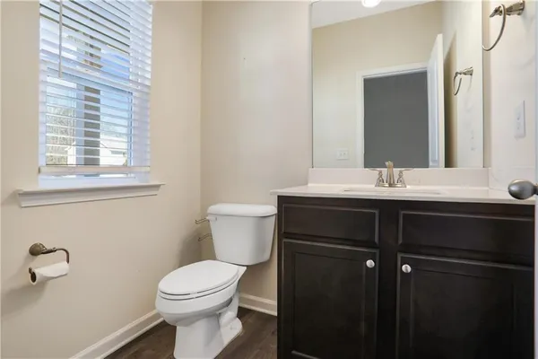 a bathroom with a sink and a toilet