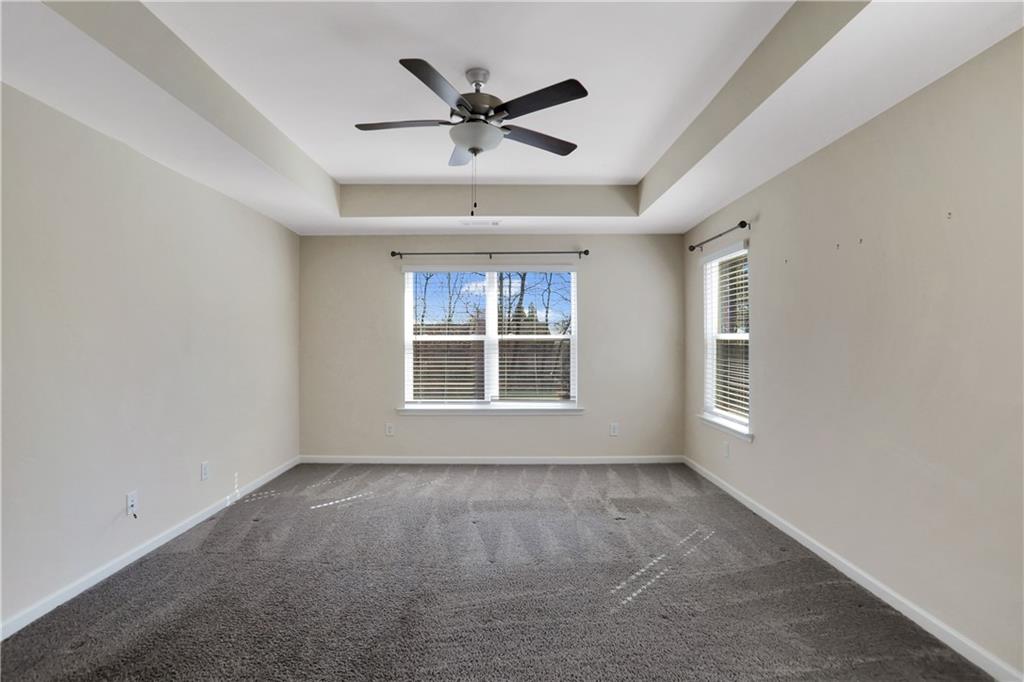 7139 Southface Way Southwest Austell, GA 30168 - Photo 15 of 27 a view of a livingroom with a ceiling fan and window