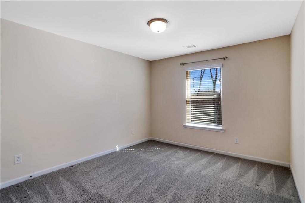 7139 Southface Way Southwest Austell, GA 30168 - Photo 21 of 27 a view of an empty room with a window