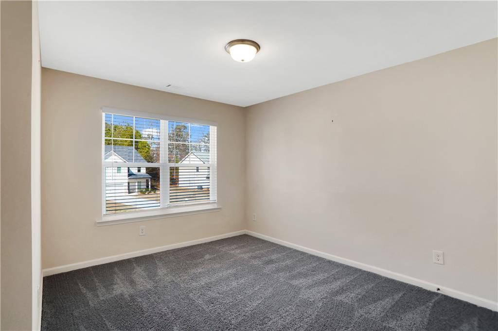 7139 Southface Way Southwest Austell, GA 30168 - Photo 22 of 27 a view of an empty room with a window