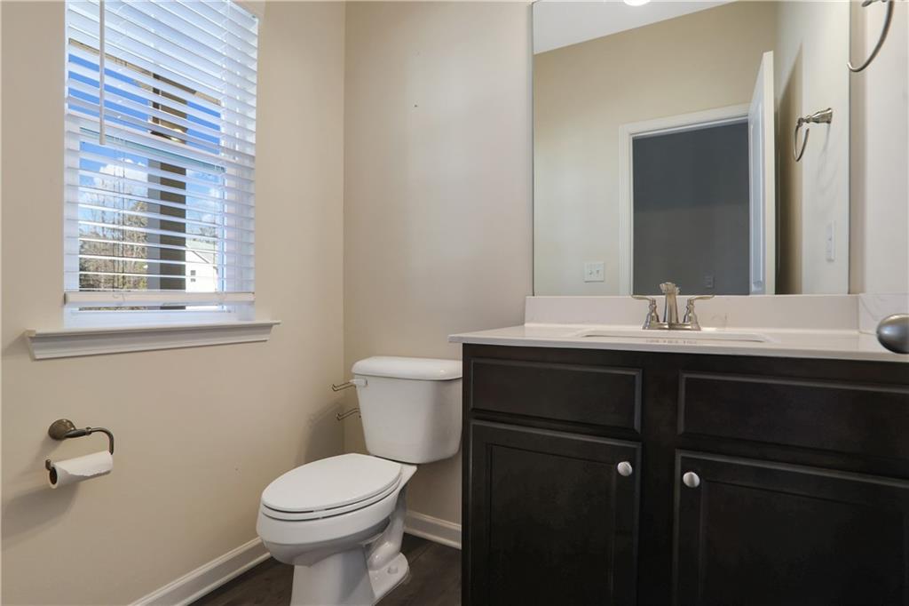 7139 Southface Way Southwest Austell, GA 30168 - Photo 24 of 27 a bathroom with a sink and a toilet