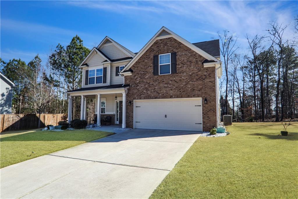 7139 Southface Way Southwest Austell, GA 30168 - Photo 27 of 27 a front view of a house with a yard
