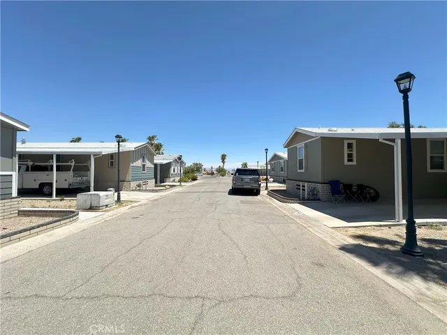 a view of a balcony with chairs