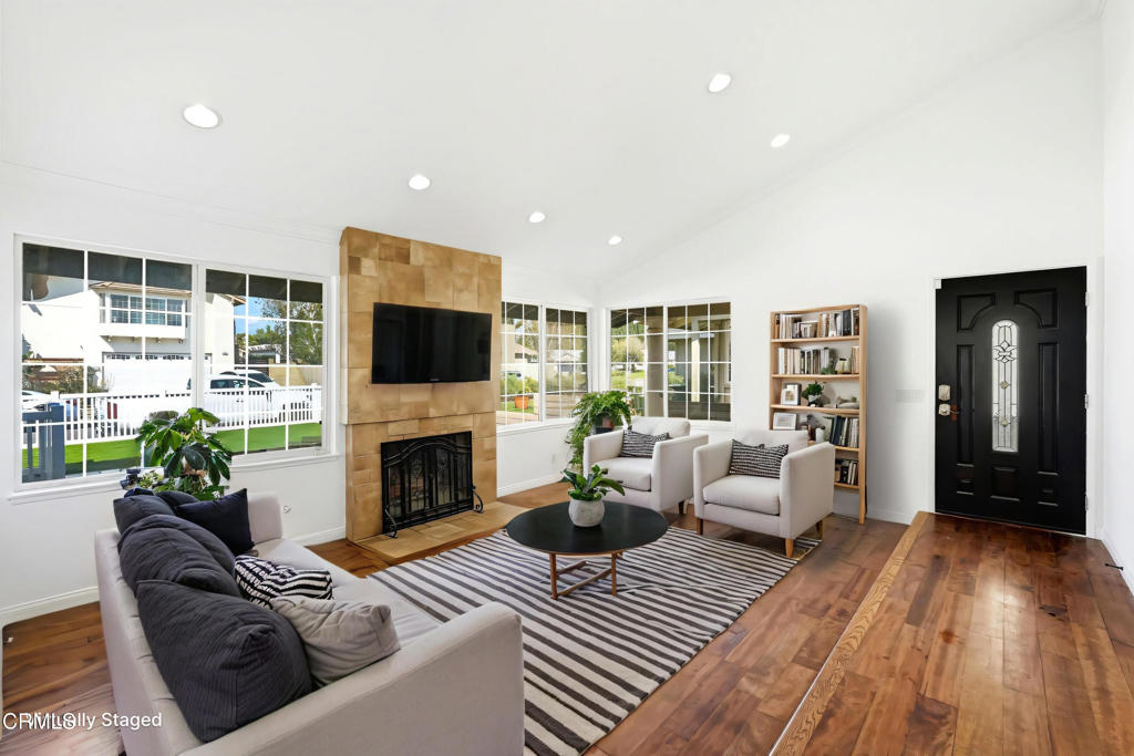 2082 Belgrave Court Simi Valley, CA 93063 - Photo 16 of 56 a living room with furniture and a fireplace
