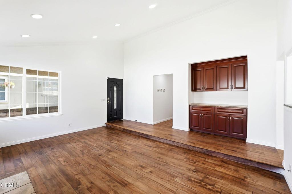 2082 Belgrave Court Simi Valley, CA 93063 - Photo 17 of 56 a view of an empty room with a window and wooden floor