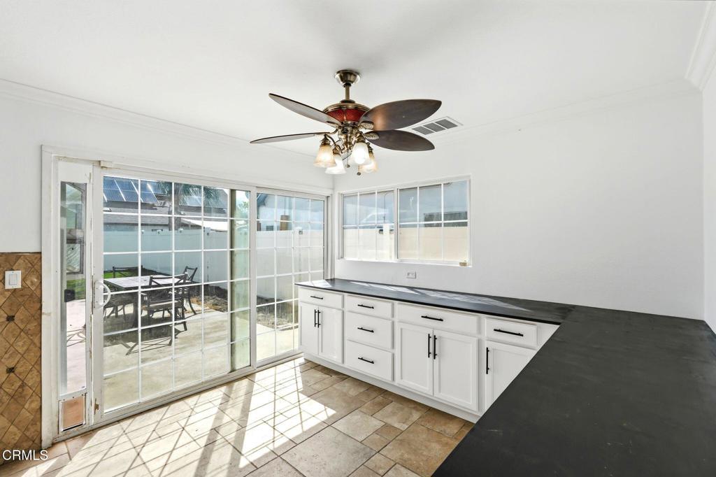 2082 Belgrave Court Simi Valley, CA 93063 - Photo 20 of 56 a large kitchen with granite countertop a sink and a cabinets