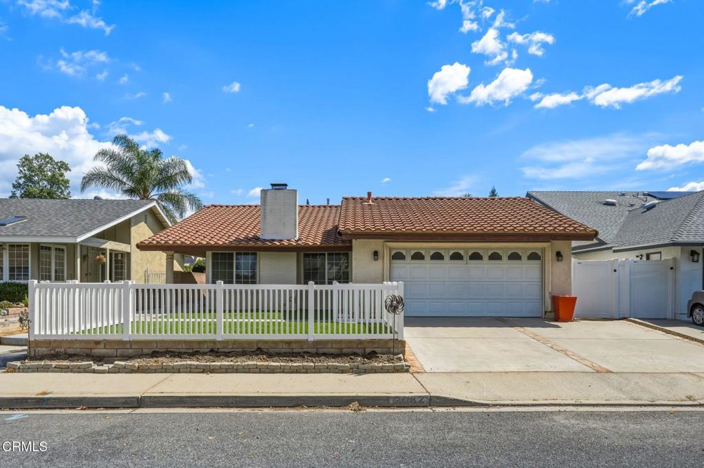2082 Belgrave Court Simi Valley, CA 93063 - Photo 2 of 56 a view of a house with a garden and pathway