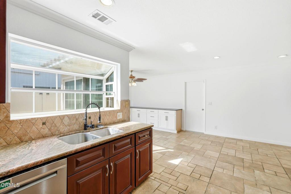 2082 Belgrave Court Simi Valley, CA 93063 - Photo 24 of 56 a kitchen with a sink and a window