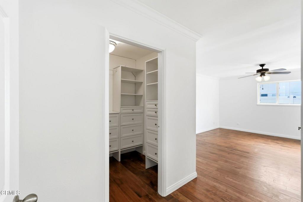 2082 Belgrave Court Simi Valley, CA 93063 - Photo 26 of 56 an empty room with wooden floor closet and windows