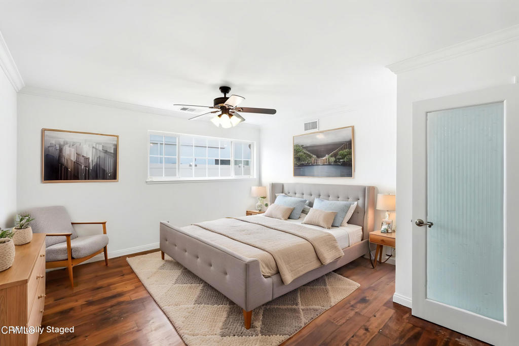 2082 Belgrave Court Simi Valley, CA 93063 - Photo 27 of 56 a bedroom with a bed and a mirror