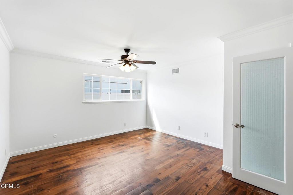 2082 Belgrave Court Simi Valley, CA 93063 - Photo 28 of 56 a view of empty room with wooden floor and fan