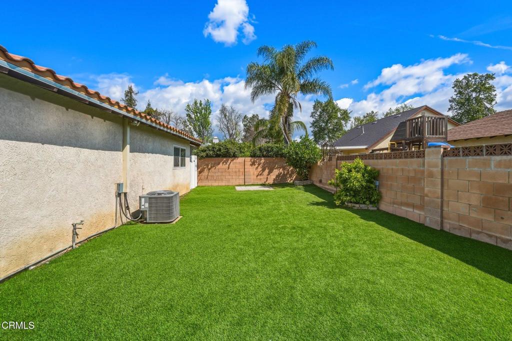 2082 Belgrave Court Simi Valley, CA 93063 - Photo 47 of 56 a view of a house with a yard