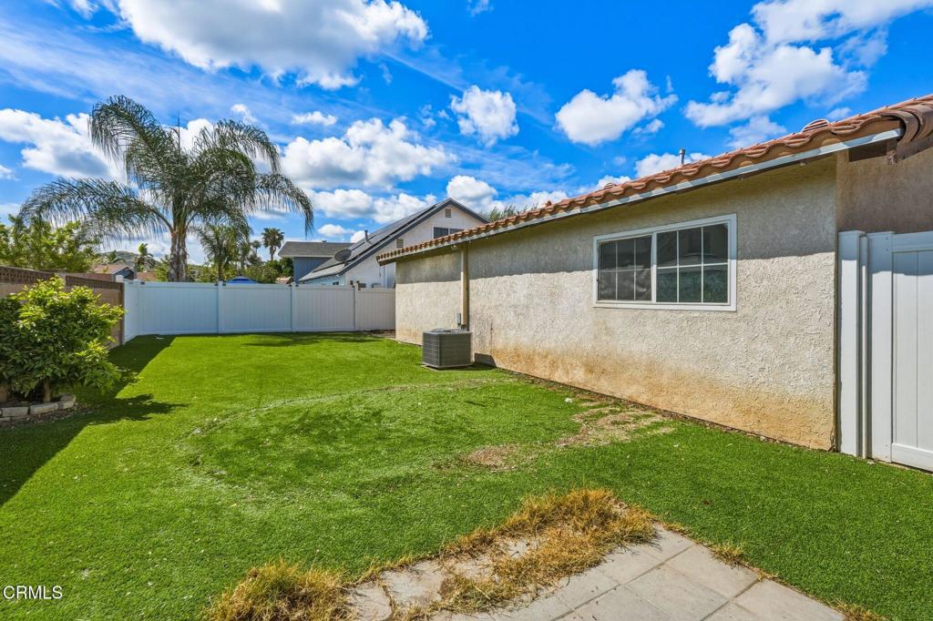 2082 Belgrave Court Simi Valley, CA 93063 - Photo 49 of 56 a view of a house with a backyard