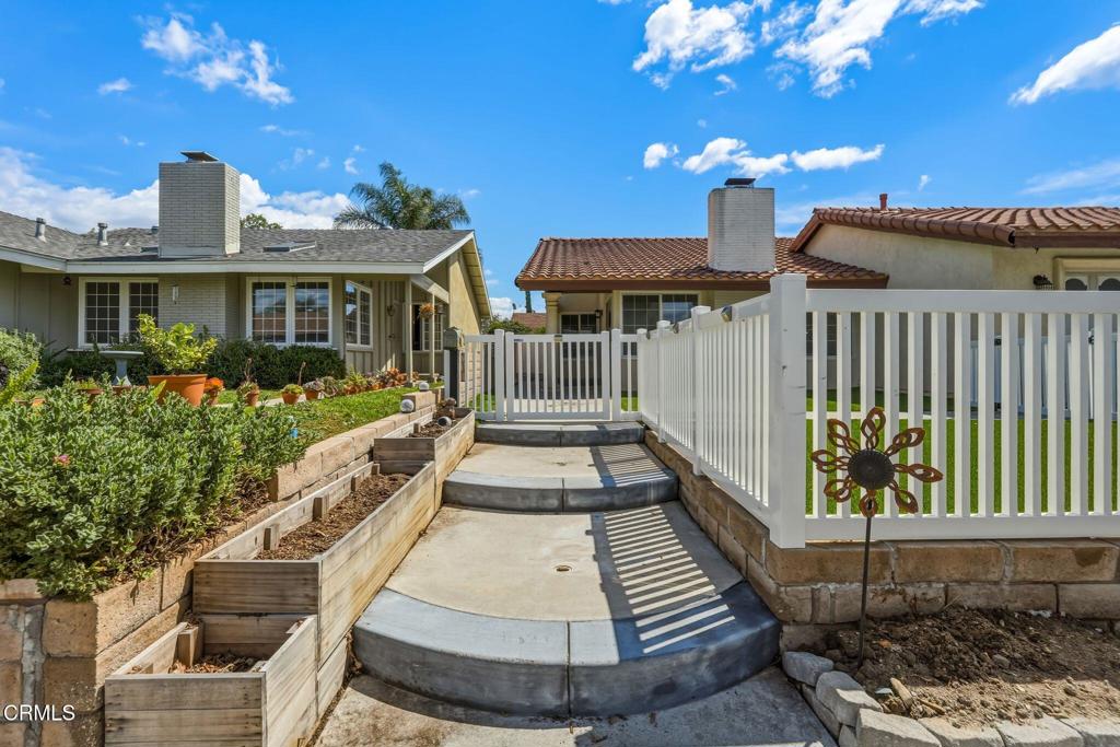 2082 Belgrave Court Simi Valley, CA 93063 - Photo 9 of 56 a front view of a house with a porch