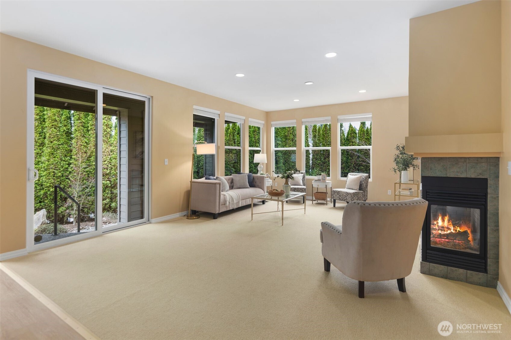 23124 Northeast Devon Way Redmond, WA 98053 - Photo 11 of 34 a living room with furniture and a fireplace