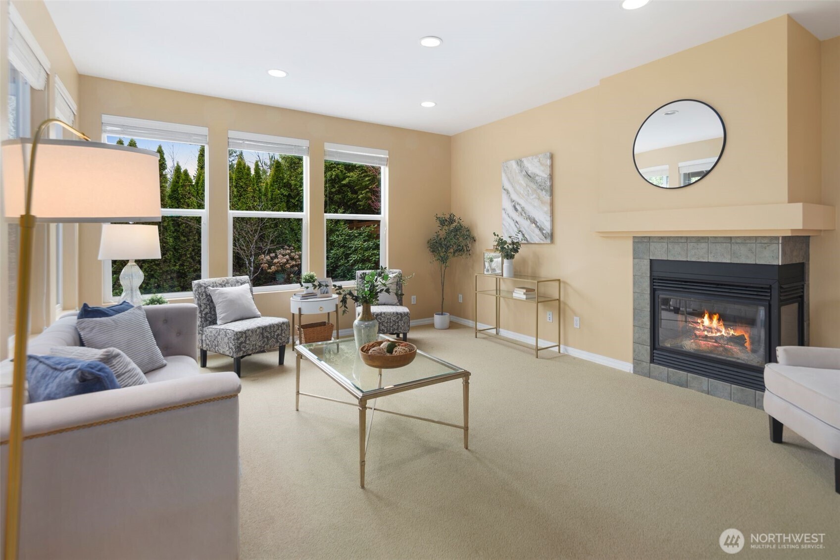 23124 Northeast Devon Way Redmond, WA 98053 - Photo 13 of 34 a living room with furniture a fireplace and a large window