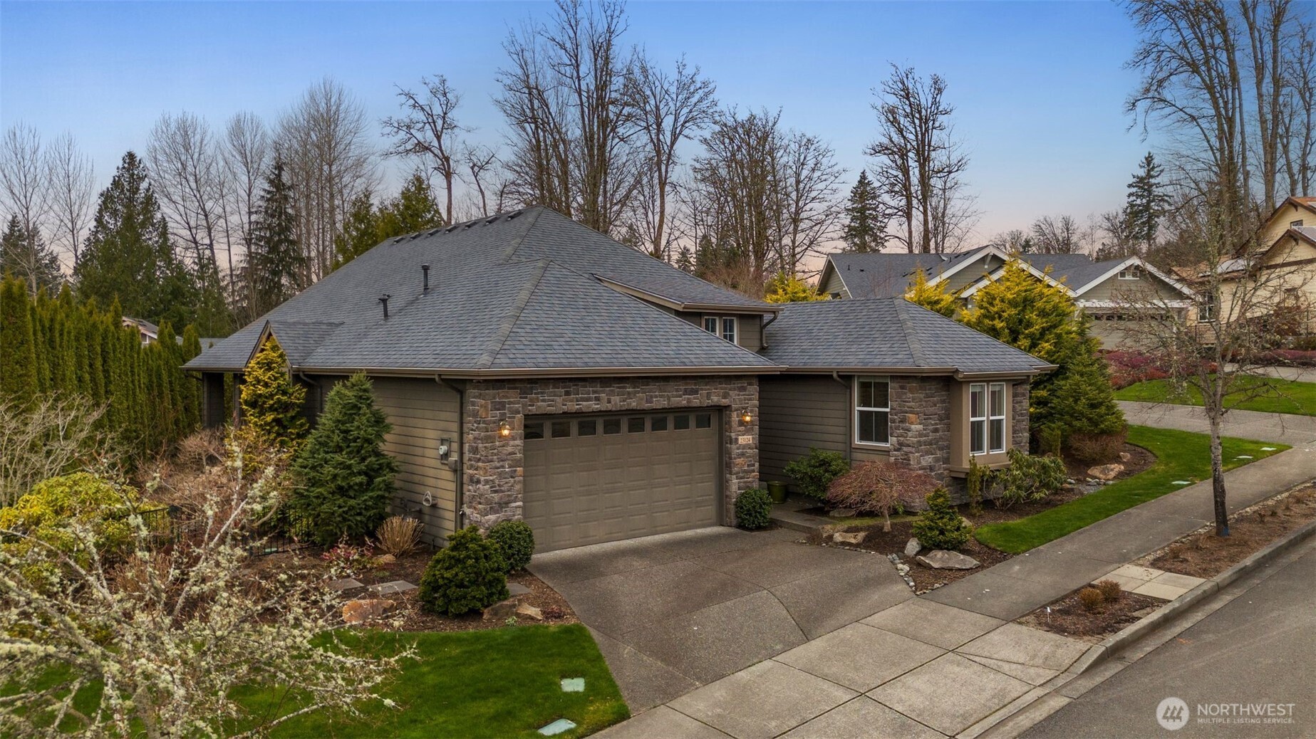 23124 Northeast Devon Way Redmond, WA 98053 - Photo 2 of 34 a view of a house with backyard and trees