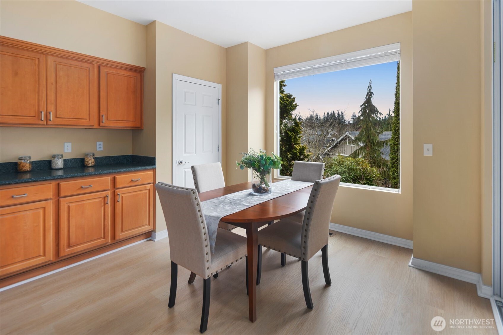 23124 Northeast Devon Way Redmond, WA 98053 - Photo 24 of 34 a dining room with furniture and window