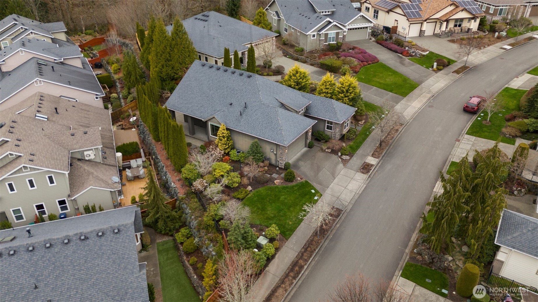 23124 Northeast Devon Way Redmond, WA 98053 - Photo 32 of 34 an aerial view of a house with a yard and lake view