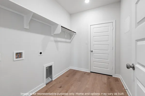 a bathroom with a shower and a sink