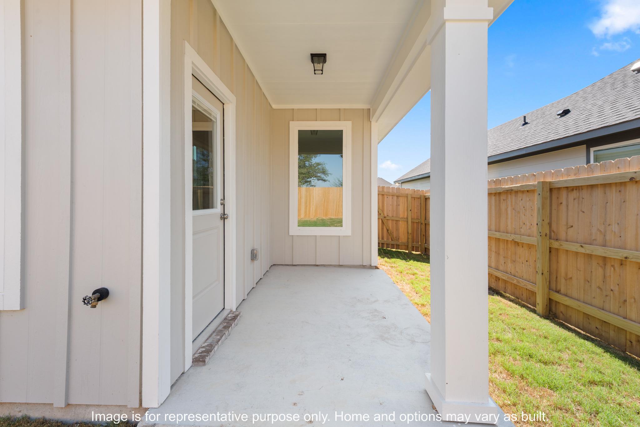 232 Gus Loop Georgetown, TX 78626 - Photo 21 of 22 a view of a hallway with wooden floor and windows