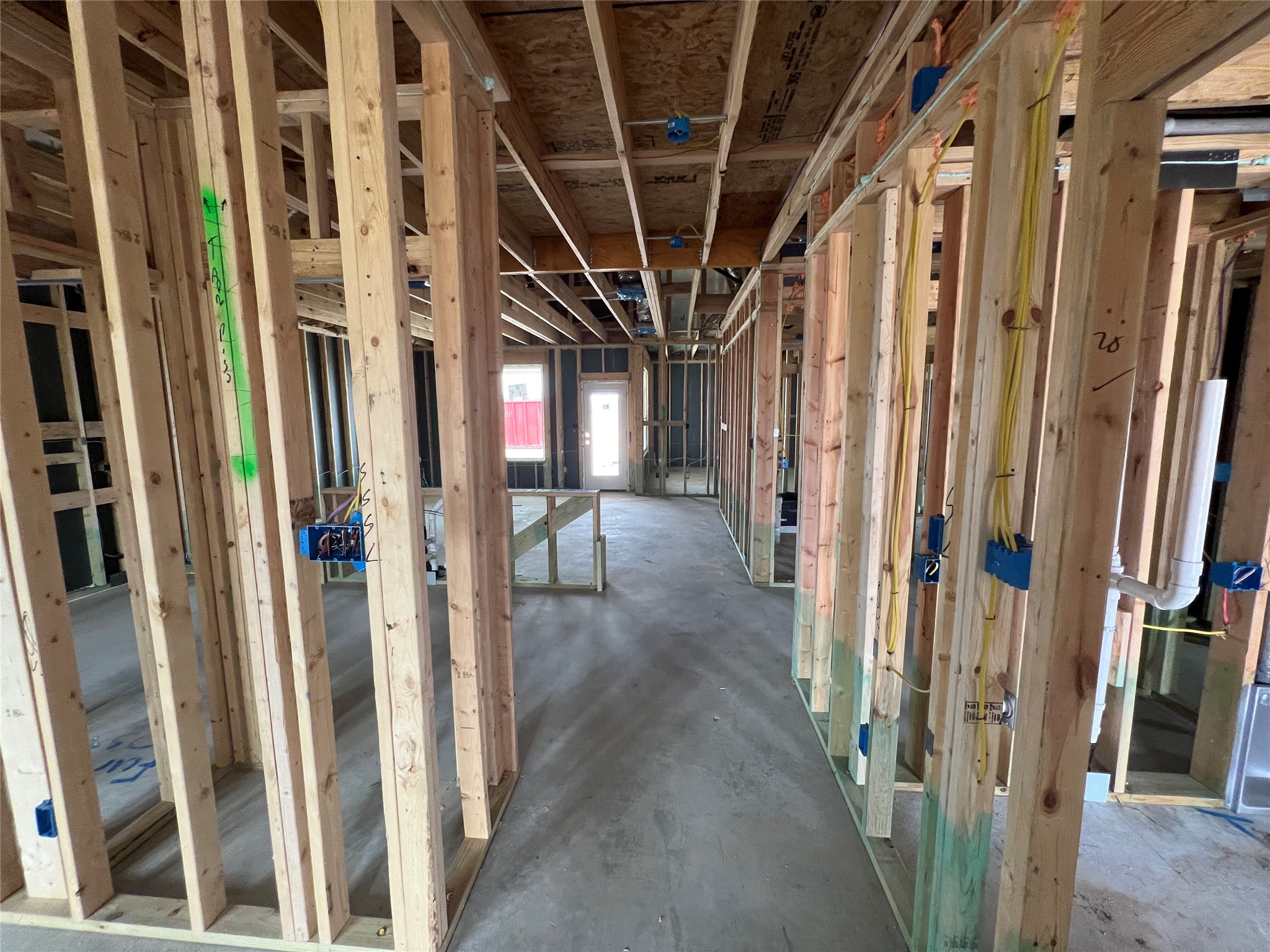 232 Gus Loop Georgetown, TX 78626 - Photo 3 of 22 a view of hallway with wooden stairs