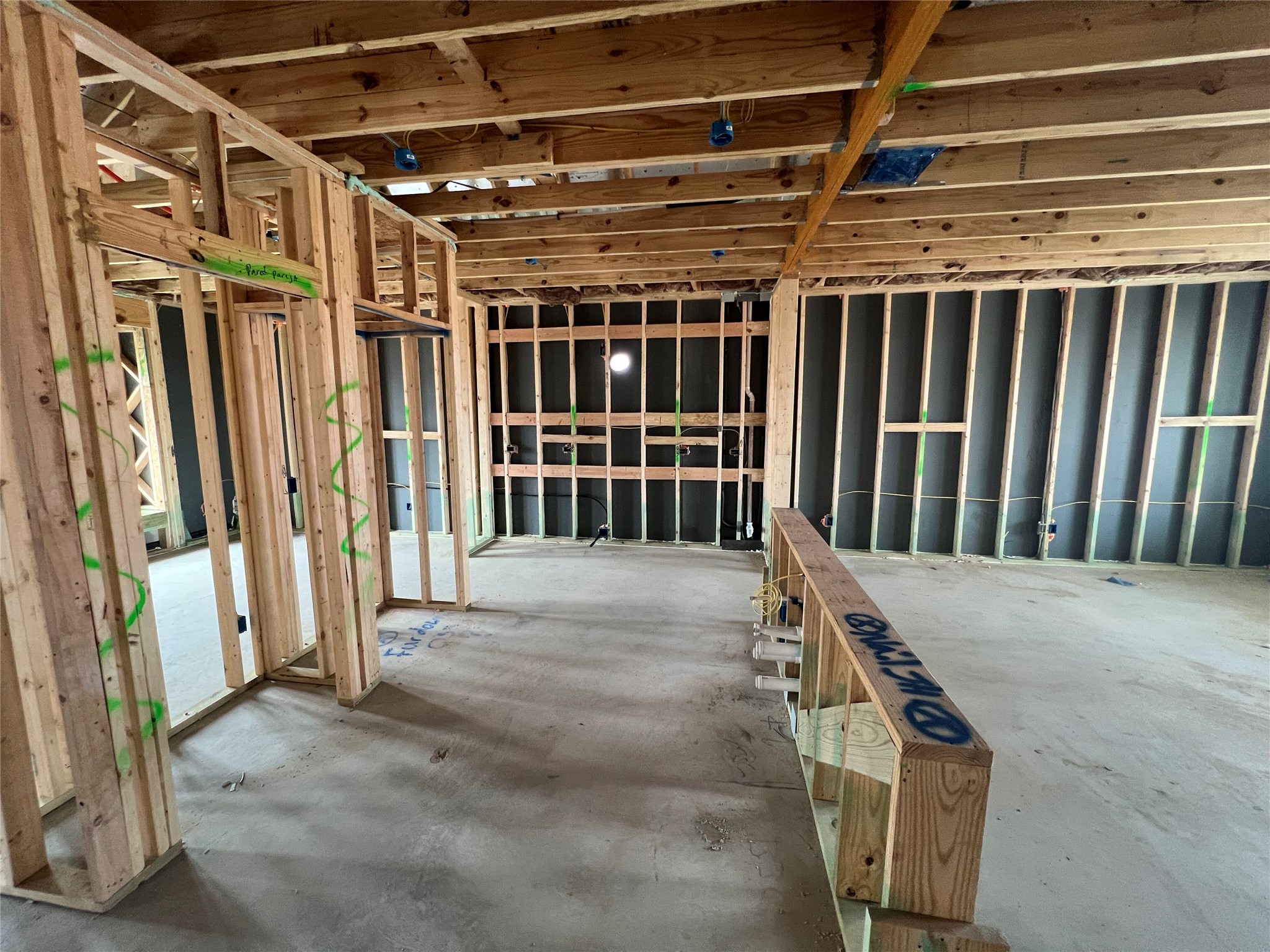 232 Gus Loop Georgetown, TX 78626 - Photo 4 of 22 a view of an empty room with wooden walls