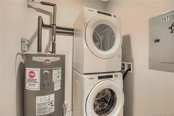 a utility room with dryer and washer