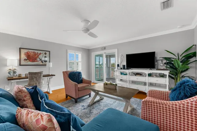 a kitchen with granite countertop white cabinets and appliances