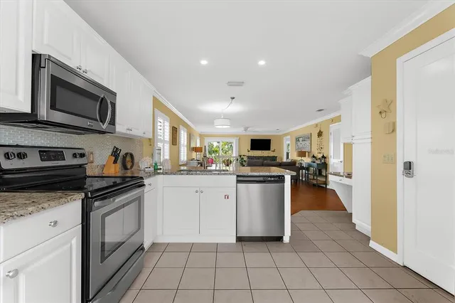a view of a patio with two chairs and a table
