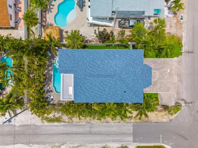 a kitchen with granite countertop white cabinets stainless steel appliances and sink
