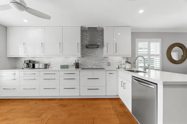 a living room with furniture or flat screen tv and a large window