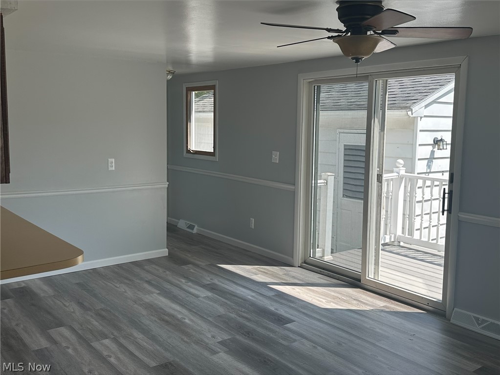 1001 Keefer Road Girard, OH 44420 - Photo 21 of 42 Family room with hardwood / wood-style floors and ceiling fan
