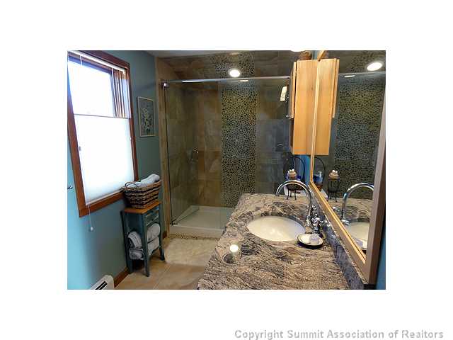 9460 Ryan Gulch Road, Unit 485 Silverthorne, CO 80498 - Photo 16 of 23 Master Bath/Spa.