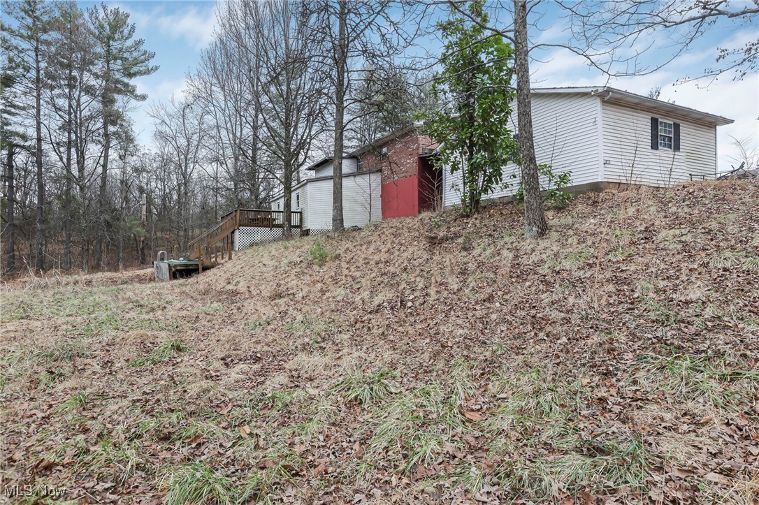 232 McGill Road Vincent, OH 45784 - Photo 43 of 49 View of yard featuring a deck