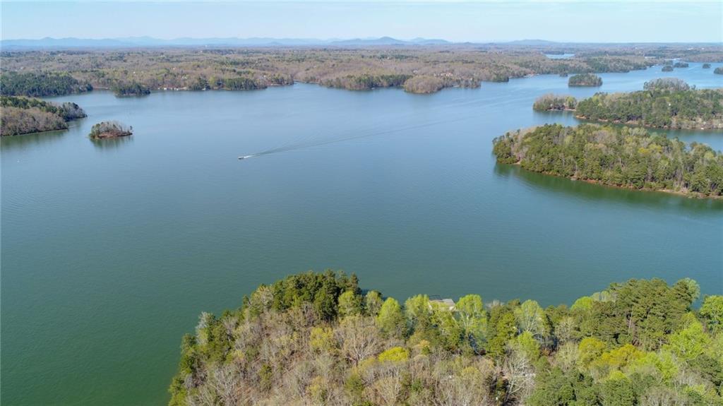 4368 Cherokee Trail Gainesville, GA 30504 - Photo 7 of 10 view of lake with mountain