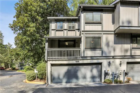 a view of a house with a street